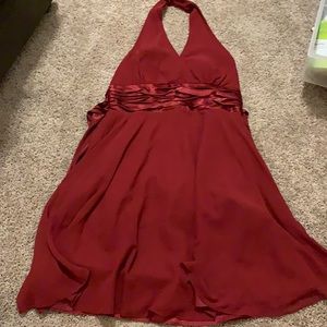 Red formal halter neck knee length dress with sash